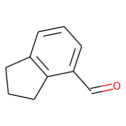1H-Indene-4-carboxaldehyde, 2,3-dihydro-